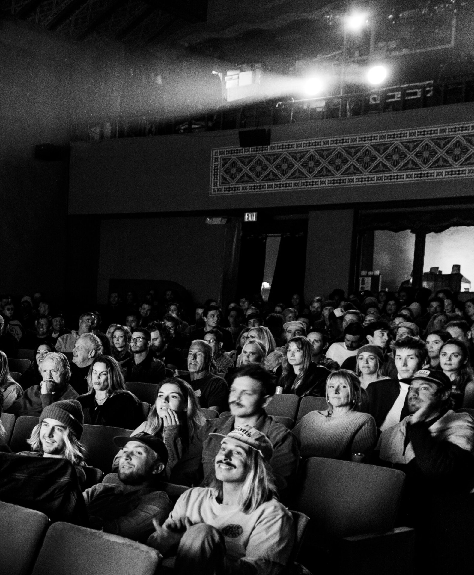 movie theater audience Photo by Daniel Guerra on Unsplash